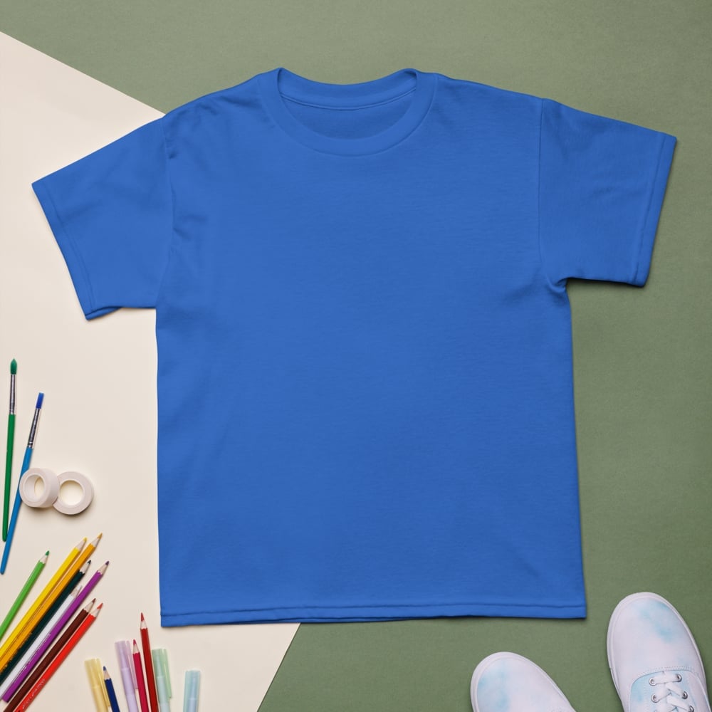 Kids performance t-shirt flat lay with art supplies, custom youth logo tee for team design