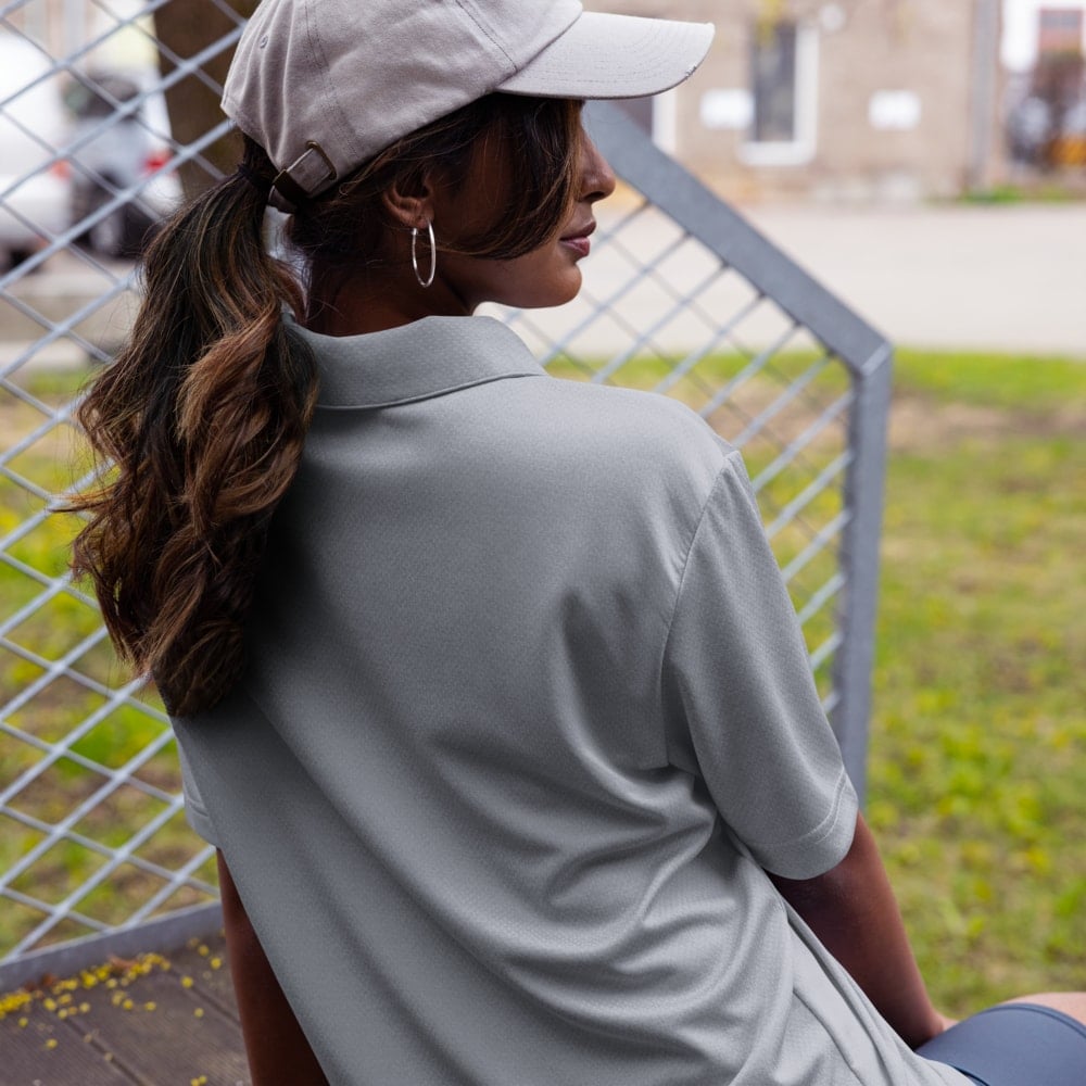Adidas space-dyed poloshirt aan hanger met geborduurd logo, betaalbare custom Adidas kleding